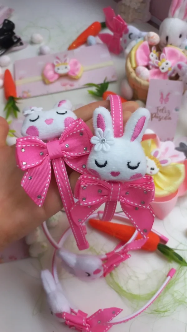TIARA COELINHO DE PELUCIA